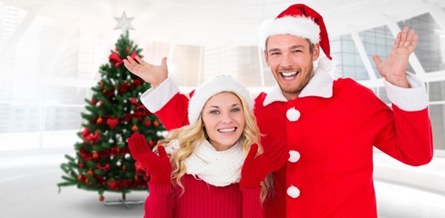 Composite image of young festive couple