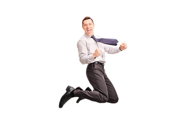 Fototapeta na wymiar Overjoyed businessman jumping