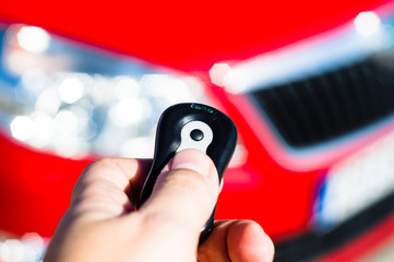 hand holding a car key