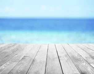 Fotobehang Wooden pier with beautiful sea or ocean  background © Africa Studio