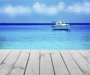 Wooden pier with beautiful sea or ocean  background