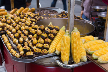 Chestnut and corn roasts in istiklal street , istanbul.They ara some of the most common street foods in the city
