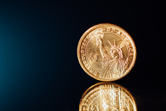 golden dollar coin with copy-space