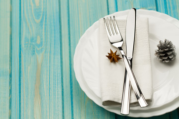 Christmas dinner table. Traditional Christmas decorations. Romantic table setting.