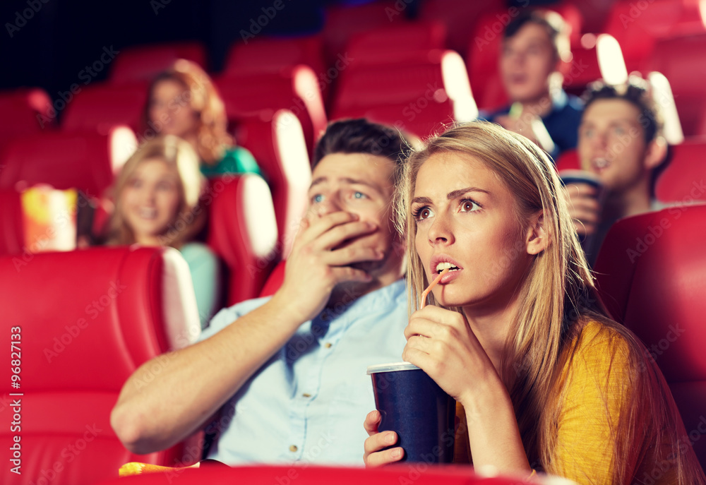 Sticker friends watching horror movie in theater