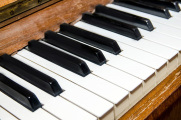 close-up of old piano keys, frontal view