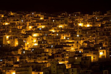 View on sicilian houses at night. Town of Cammarata, near Agrigento. Sicily