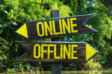 Online - Offline signpost with forest background