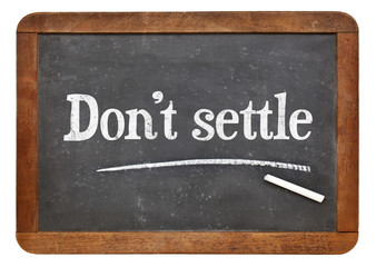 Fototapeta premium Do not settle on blackboard