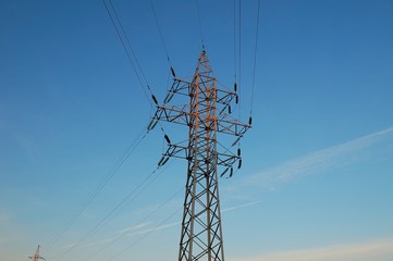 high-voltage power line against the background of the sky