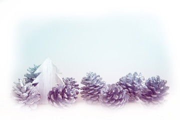 pinecones and miniature wooden tree