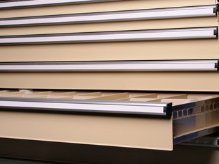 Heavy duty industrial tool drawer cabinet with one open drawer in beige with aluminum handles, Australia 2015
