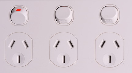 Three fold low voltage power wall outlets with one switched on, Australia 2015
