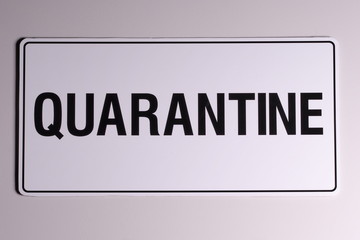 Quarantine wall sign in black on off white background on a wall, Australia 2015
