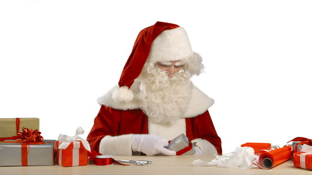 Santa Claus is Trying to Wrap a Gift and Getting Nervous