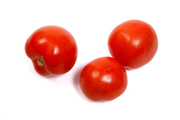 Ripe tomatoes isolated on white