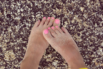 Beautiful feet on stone in Thailand.