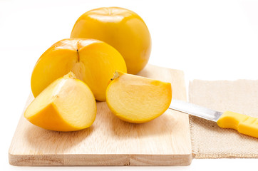 yellow fruit on white background