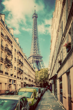 Eiffel Tower seen from the street in Paris, France. Vintage