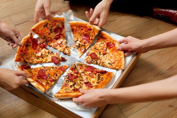 Eating Pizza. Group Of Friends Sharing Pizza. Fast Food, Leisure