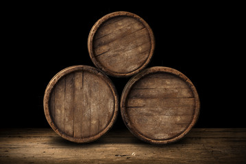 Beer barrel with beer glasses on a wooden table. 