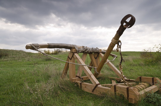 Dramatic clouds and an ancient camp, restored from medieval time