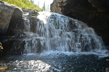 Naklejka premium Waterfall in the rocks.