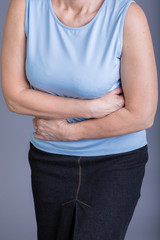 Woman with a stomach ache