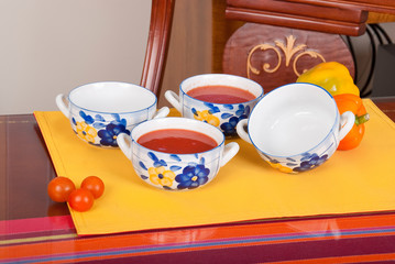 Pile of clothes and electric iron