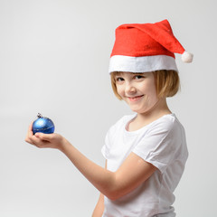 Girl holding a Christmas ball