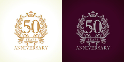 50 anniversary luxury logo. Template logo 50th royal anniversary with a frame in the form of laurel branches and the number fifty. - obrazy, fototapety, plakaty