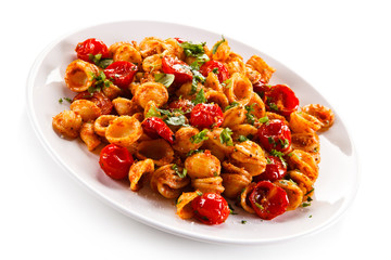 Orecchiette pasta, tomato sauce and vegetables