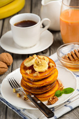 Pumpkin pancakes with bananas and walnuts