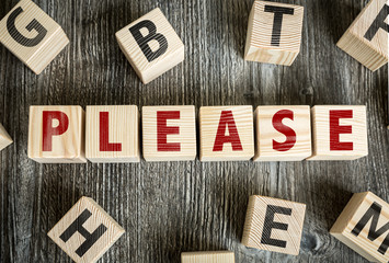 Wooden Blocks with the text: Please