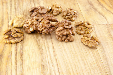 Walnuts on wood.