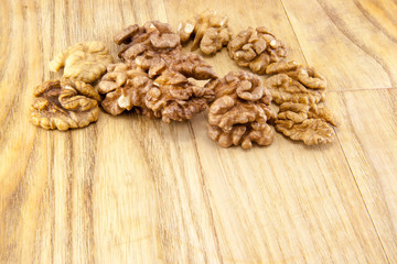 Walnuts on wood.