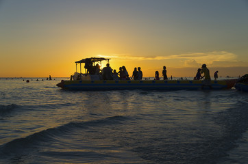 banana boat at sunset