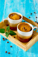 Cupcakes in a mug with a creamy caramel cream