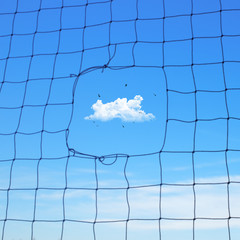 broken net shows clouds in the sky