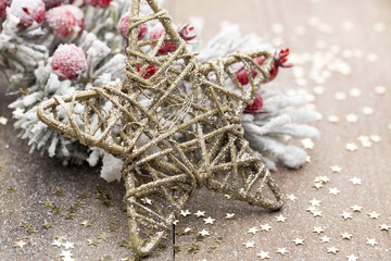 Naklejka premium Christmas decoration with fir branches on the wood background.