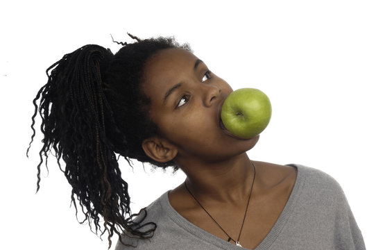 Teenage Girl Biting An Apple