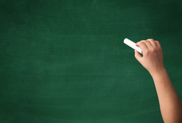 Hand writing on clean blackboard