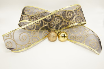 golden transparency ribbon with christmas balls
