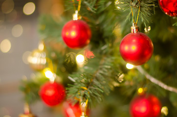 Fototapeta na wymiar Christmas and New Year Decoration. Bauble on Christmas Tree. Abs