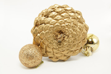 golden christmas balls and pine cone