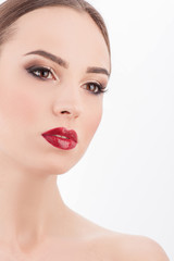 Fototapeta premium Cheerful young woman is getting make-up treatment