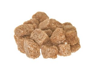 Raw sugar cubes isolated on white