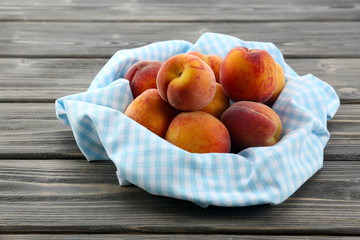 Sweet ripe peaches on table close up