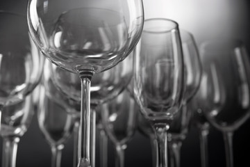 Empty wine glasses on gray background