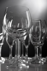 Empty wine glasses on gray background